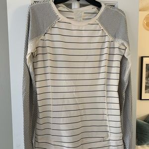 Lululemon ivory top with lace and ruffle detail